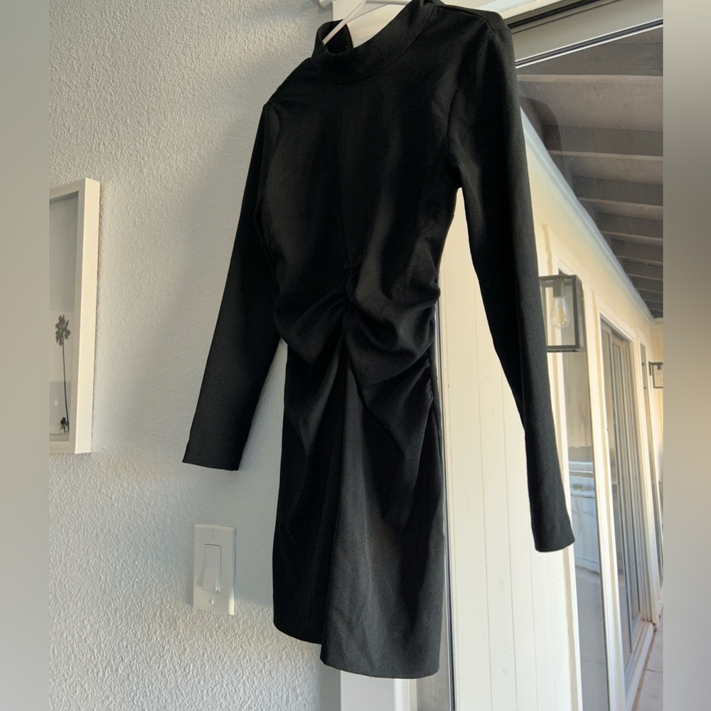 Brand new black dress from Zara. Size 2.